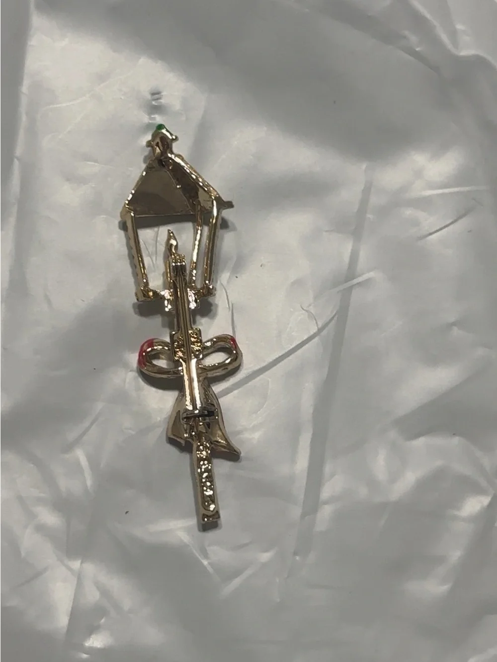 Gold Lamp Post Brooch with Red Ribbon and Emerald Accent